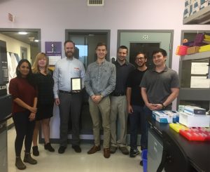 MPP Sam Oosterhoff (centre) and Vineland staff (L-R): Charlene Williams, 
Christine Kempthorne, Dr. David Liscombe, Jason Henry, Ryan Munroe and Kevin Hooton (missing from photo Dr. Darby McGrath).