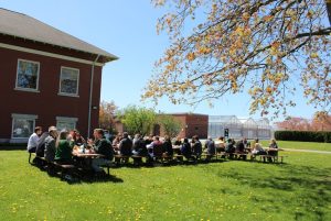 Image of the workshop attendees enjoying the sunshine in our grounds.